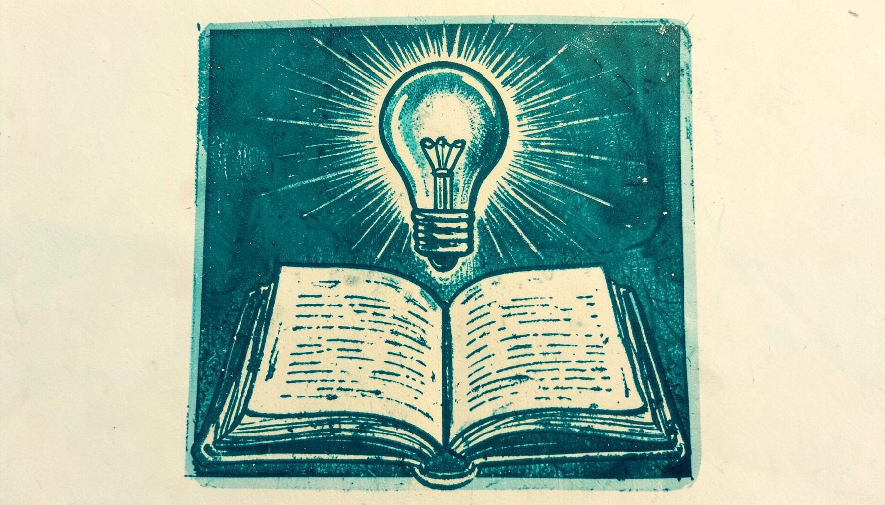 A carved linocut relief print of a lightbulb glowing above an open notebook, rendered in deep teal and warm cream tones, idea-generation mood
